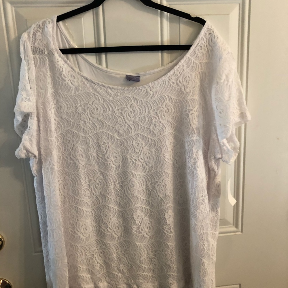 White lace blouse has tag